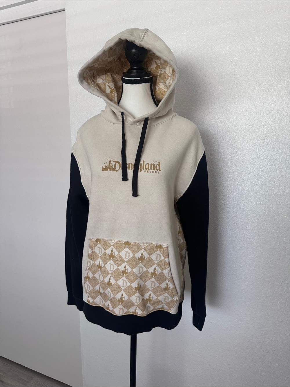 Disney Beige Hoodie with Black Accents and Gold Print